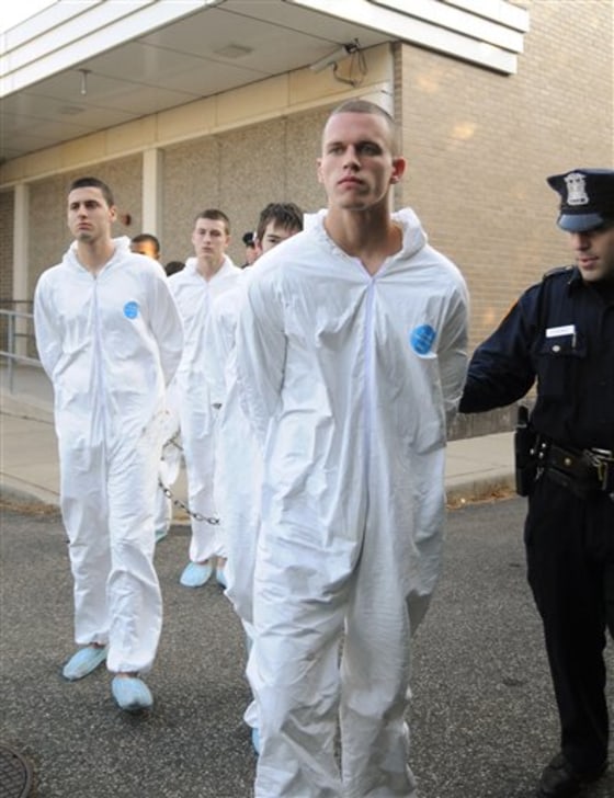 Jeffrey Conroy, 17, foreground, and other teens arrested in connection with the hate crime murder of an Ecuadorean immigrant, in the Fifth Precinct in Patchogue, N.Y.